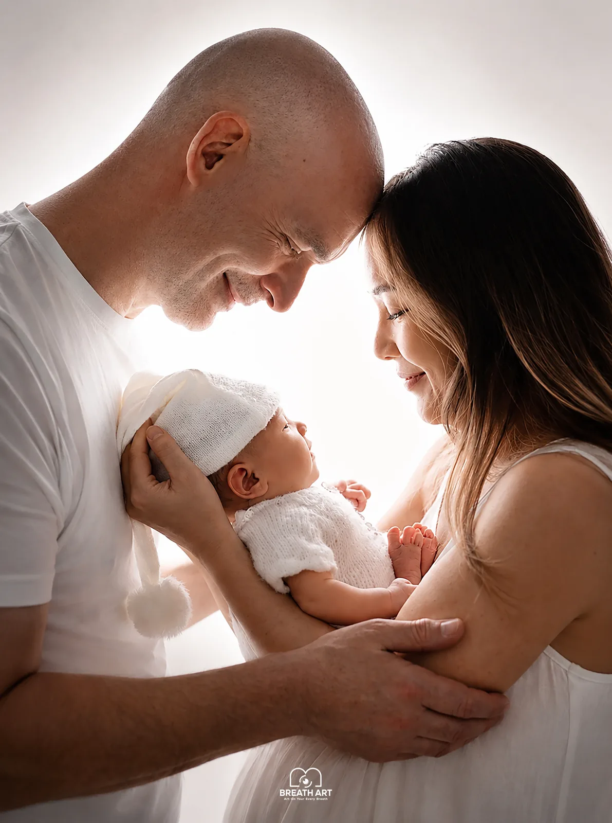 Parents with their newborn during a family photoshoot in Dubai