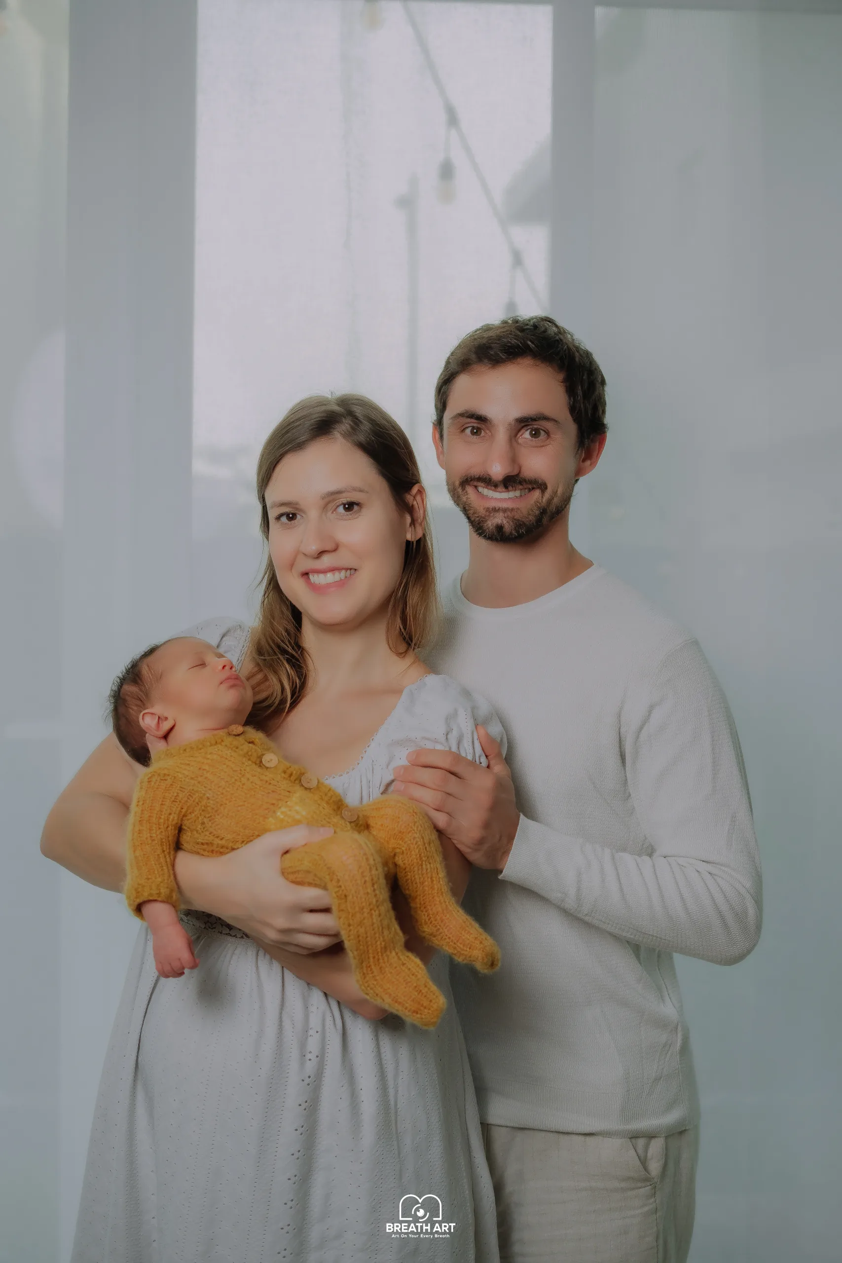 Family portrait with newborn baby at home, BreathART home photography UAE